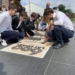 Rajmundalia 2024. Łodzianie układali wielkoformatowe puzzle z mapą Łodzi z 1823